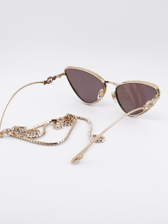 Gucci GG1569S 001 Sunglasses Gold with White Stone Cat Eye Frame, Brown Lenses main image 10